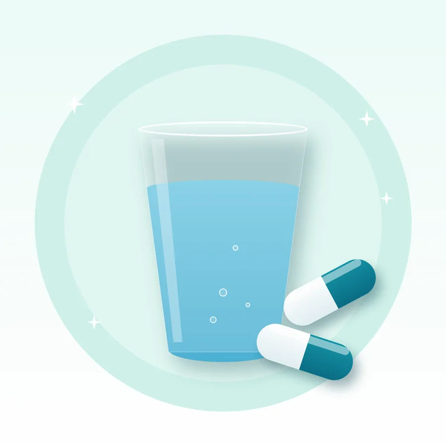 Vaso de agua y cápsulas de NAC